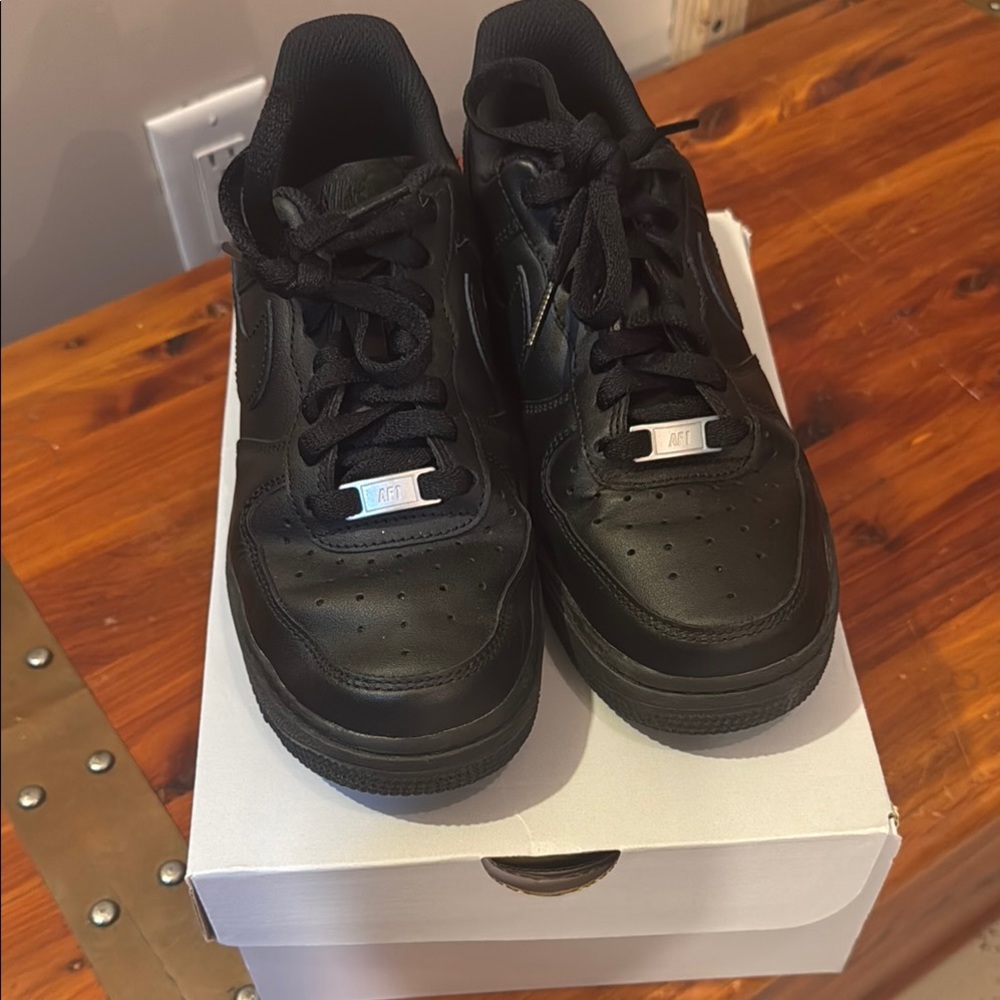Nike Black Air Force Ones Low-Top Leather Design